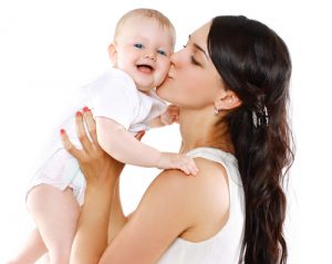 Mom Kissing Baby on Cheek